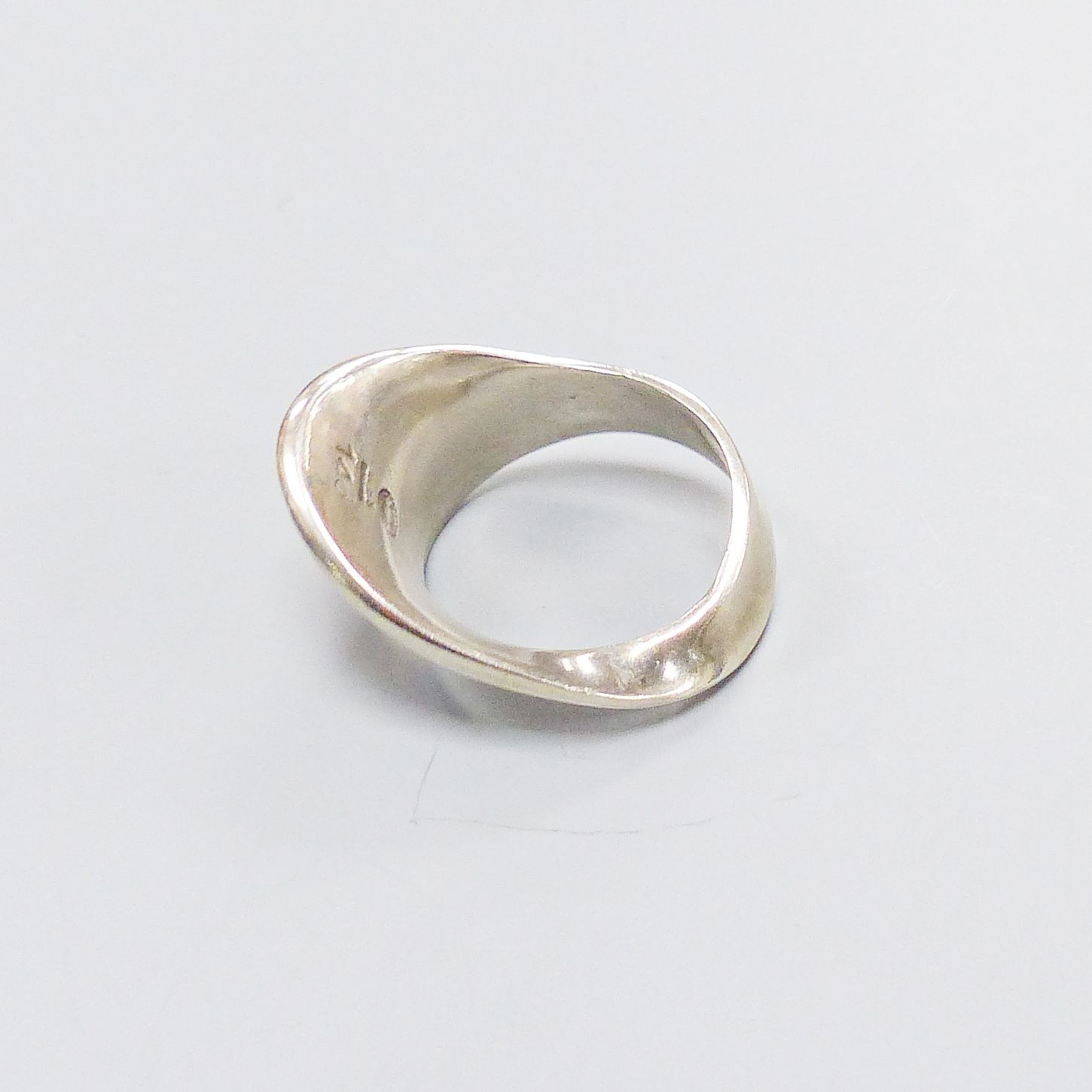 A Georg Jensen sterling ring, no. 148, size O.